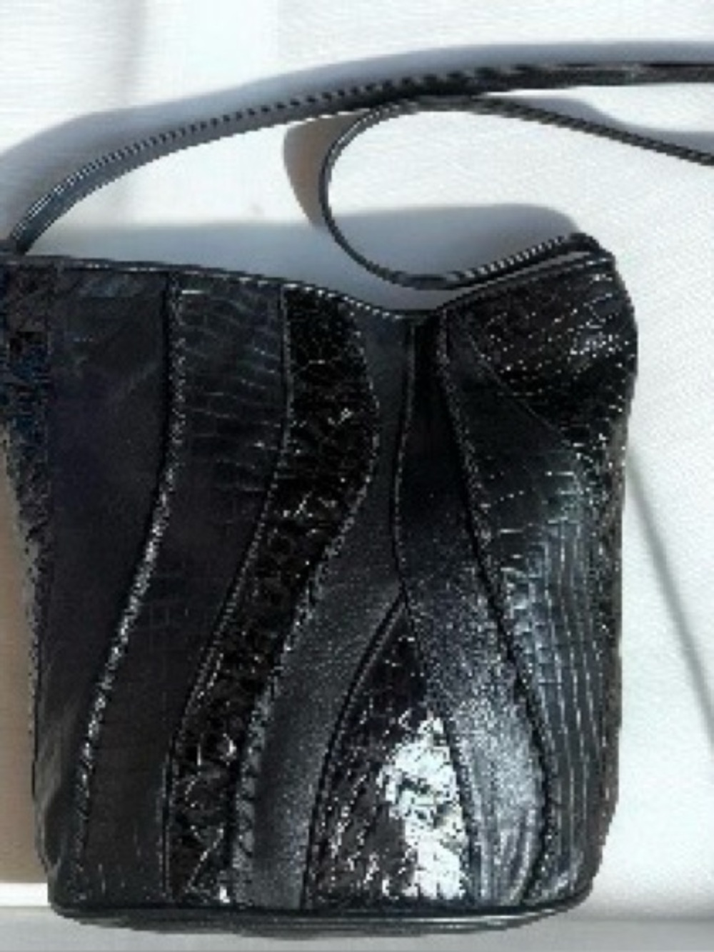 Cache Black Embossed Bucket Shoulder Bag with Tassel